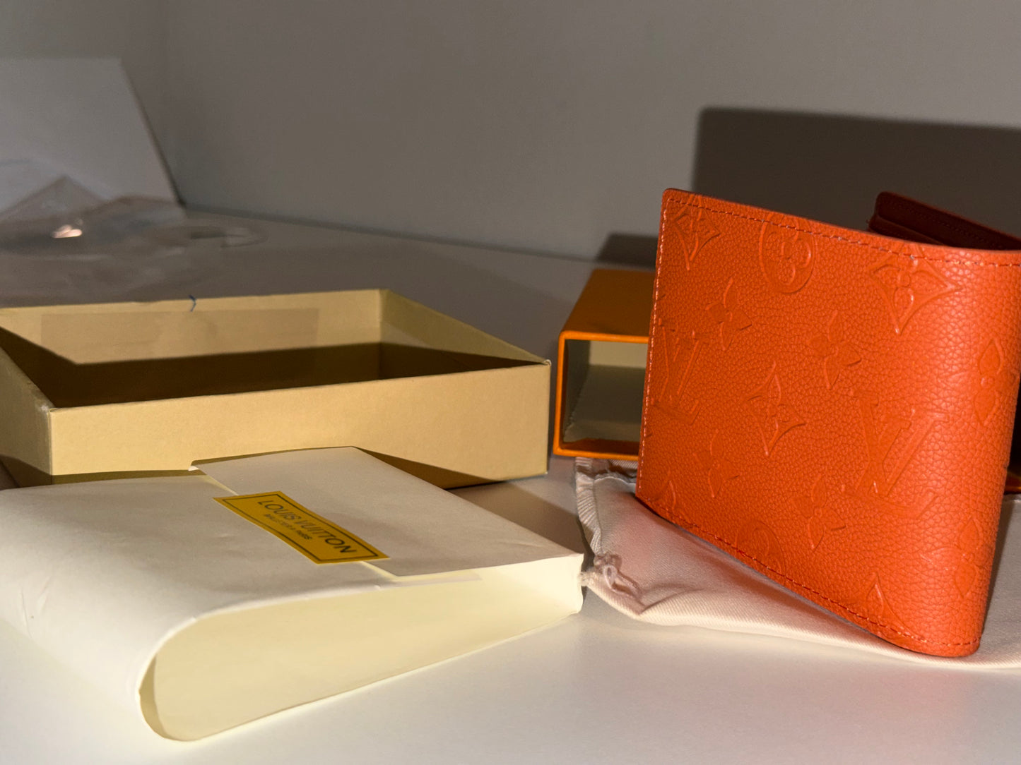 Louis Vuitton Slender Wallet in orange Taurillon leather from the Virgil Abloh collection