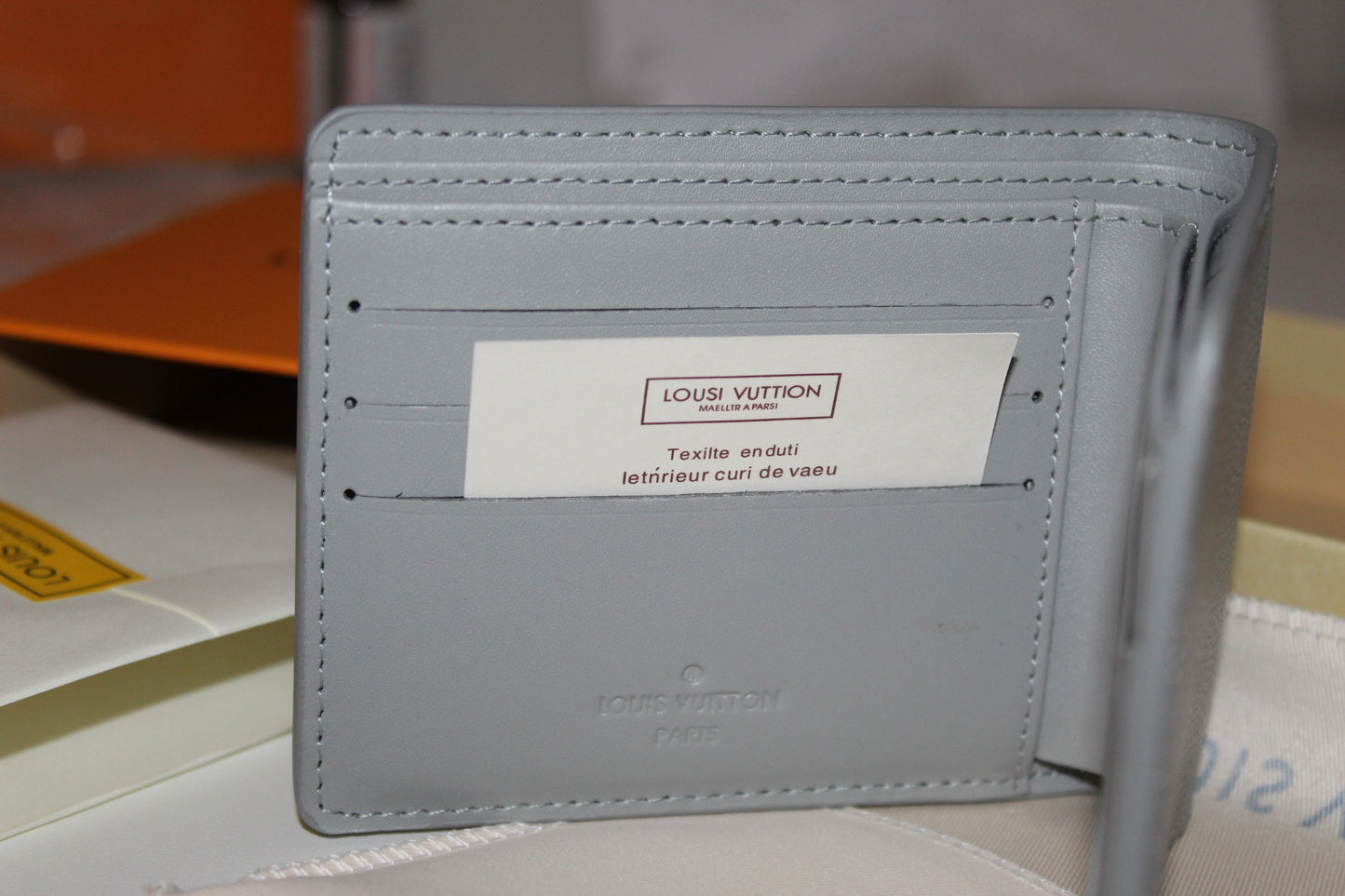 Louis Vuitton LV Aerogramme Multiple Wallet in grey cowhide leather