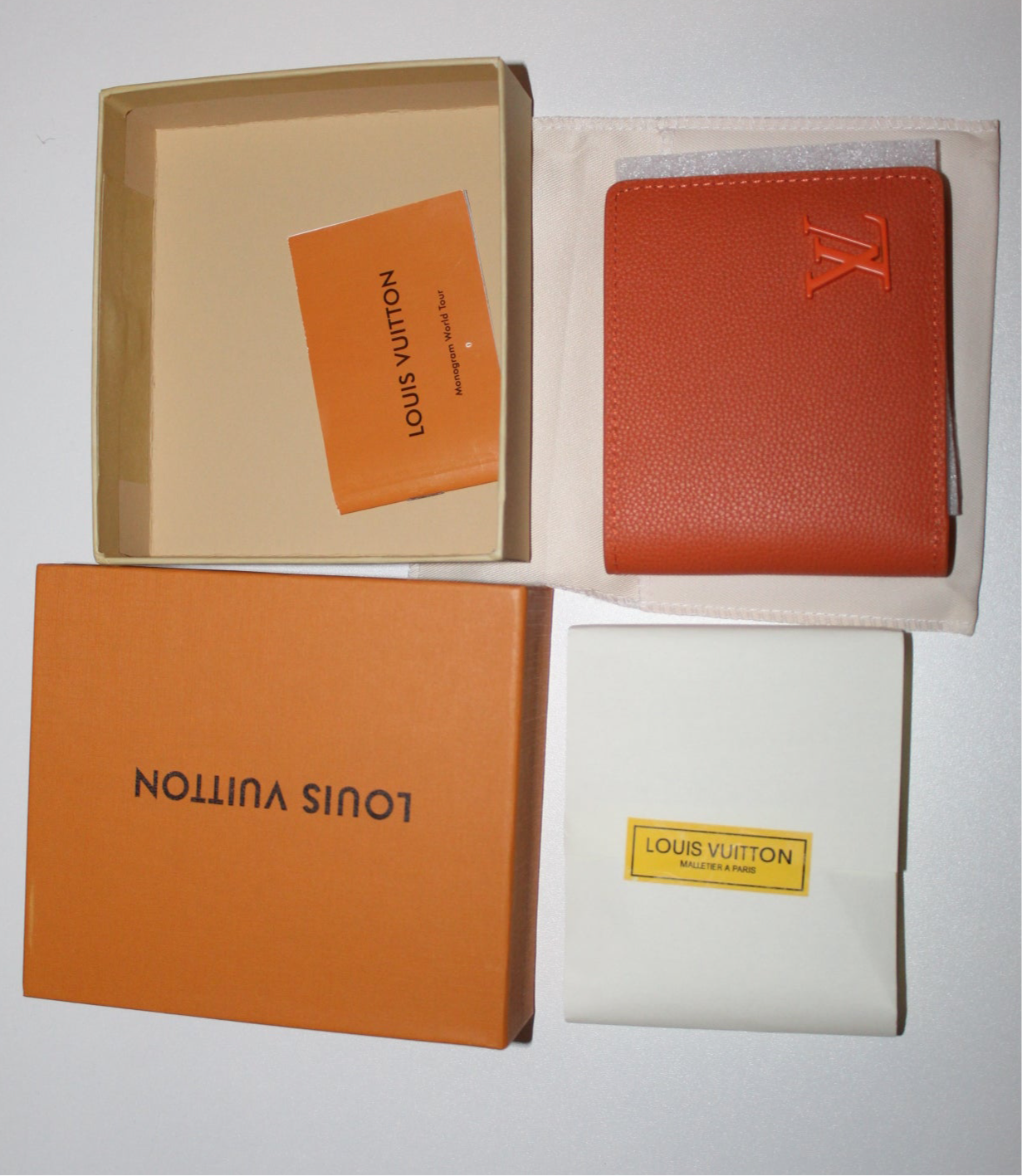 Louis Vuitton Multiple Wallet in orange LV Aerogram leather
