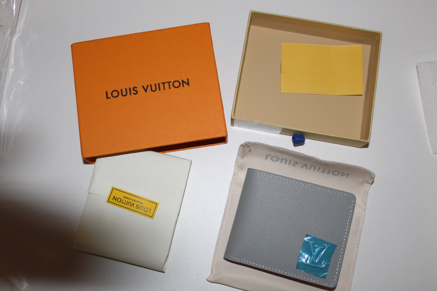 Louis Vuitton LV Aerogramme Multiple Wallet in grey cowhide leather