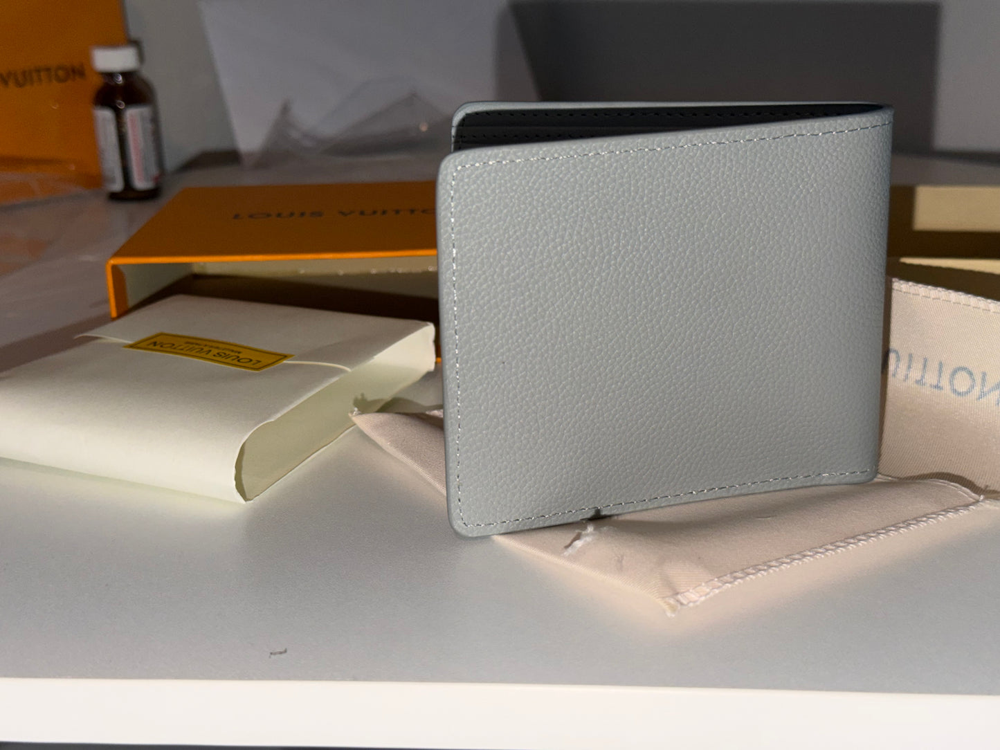 Louis Vuitton LV Aerogramme Multiple Wallet in grey cowhide leather
