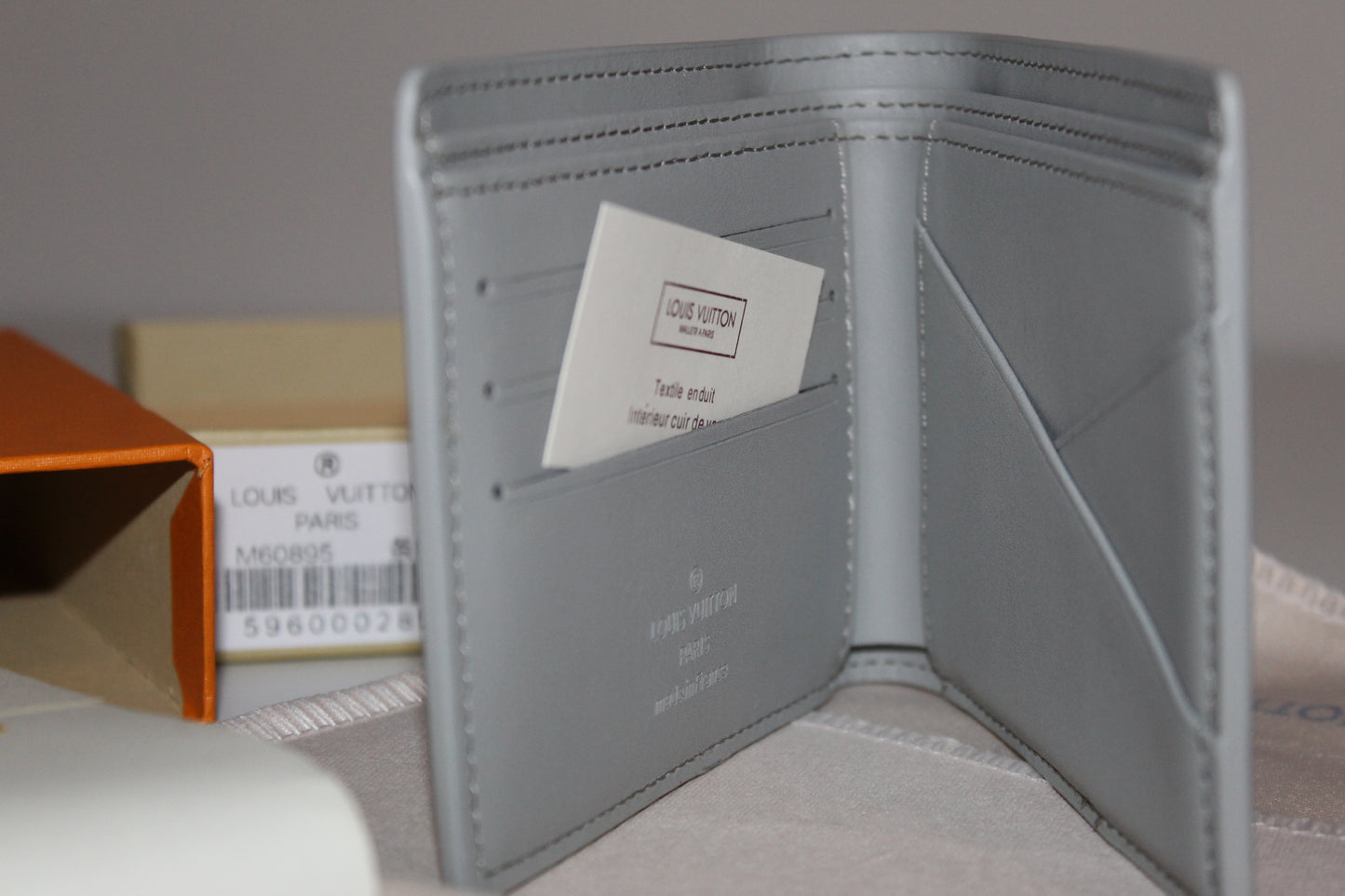 Louis Vuitton Multiple Wallet in Monogram Shadow calfskin leather, color Anthracite